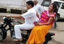 मंत्री जी बाइक पर बिना हेलमेट पत्नी संग जा रहे थे और कट गया चालान…